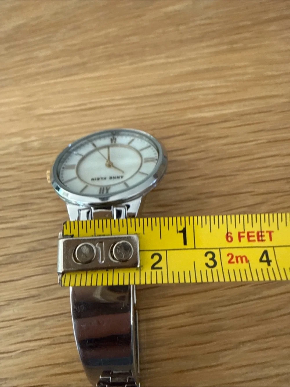 Anne Klein Watch w/ Mother Of Pearl Face. Silver & Gold Tone Adjustable Bracelet
